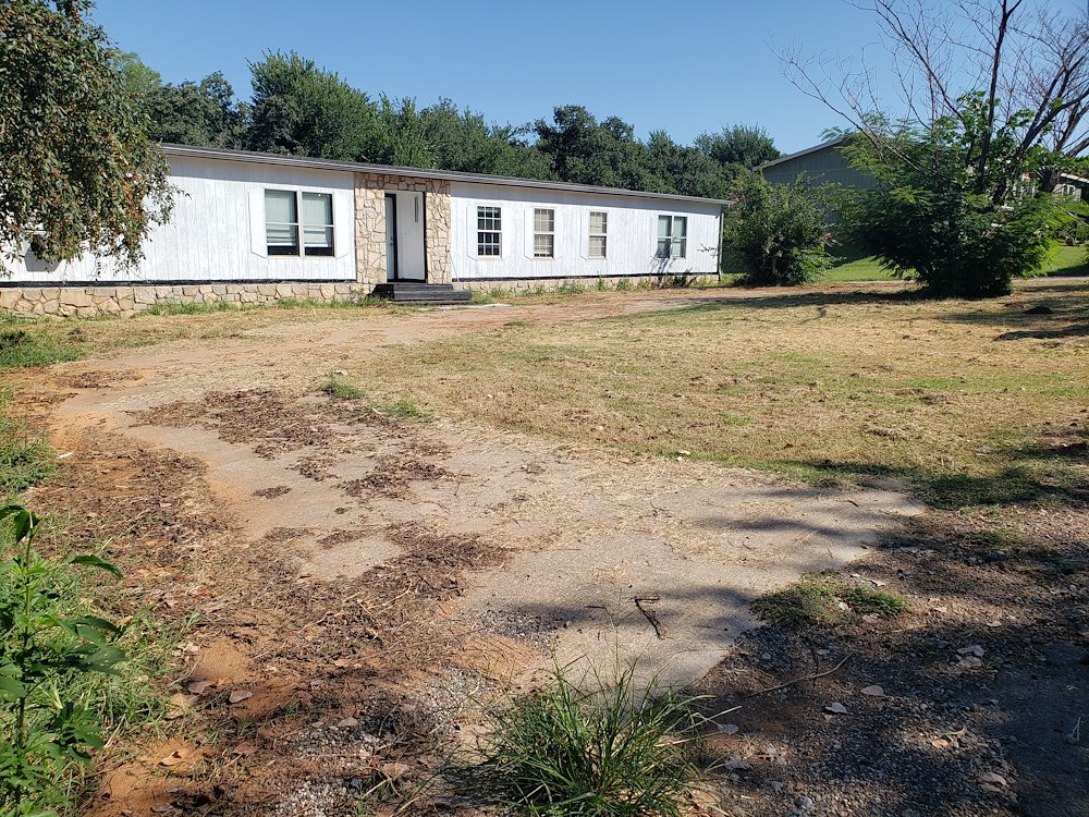 Driveway cleaning for an investor in Edmond, Ok