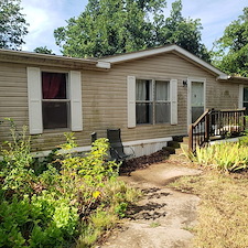 Soft-wash-a-vinyl-siding-home-and-front-porch-cleaning-in-edmond-ok 0