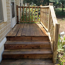 Soft-wash-a-vinyl-siding-home-and-front-porch-cleaning-in-edmond-ok 1